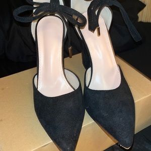 Women’s Black suede , heels size 8.